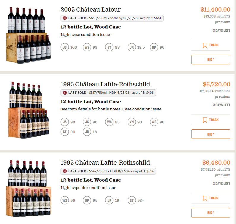 Three lots in a live catalogue, each with a LAST SOLD badge under the wine name